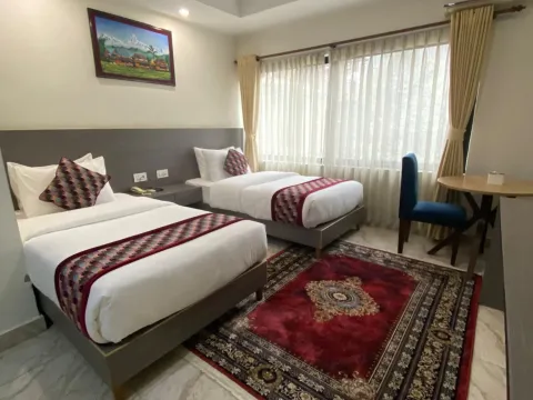 Travelers relaxing in comfortable accommodation after an exciting Trishuli rafting trip