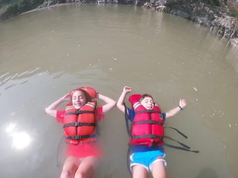 cenic Trishuli River rafting with mountains and forested hills