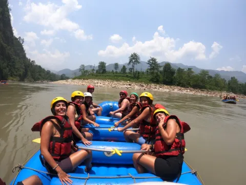 Rafters enjoying a scenic Lower Seti River journey surrounded by nature