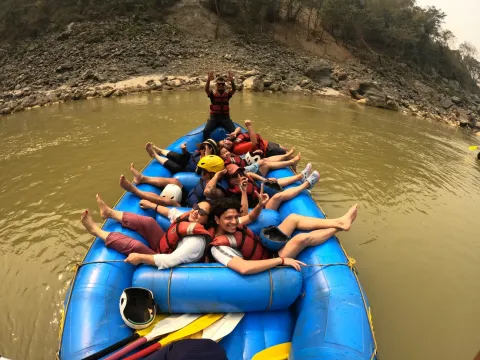 Scenic Lower Seti River surrounded by lush forests and hills