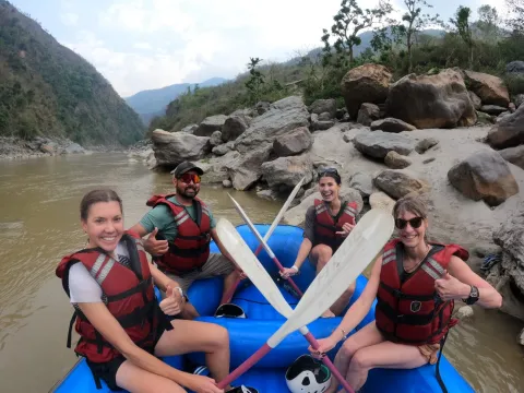 Rafters relaxing beside the Lower Seti River after rafting
