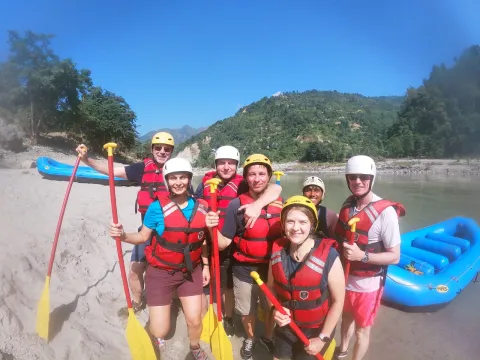 Rafters wearing helmets and life jackets on the Seti River