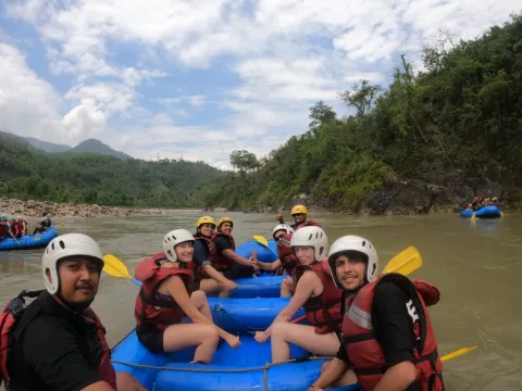 Whitewater rafting through forests, valleys, and riverside villages on the Marsyangdi River