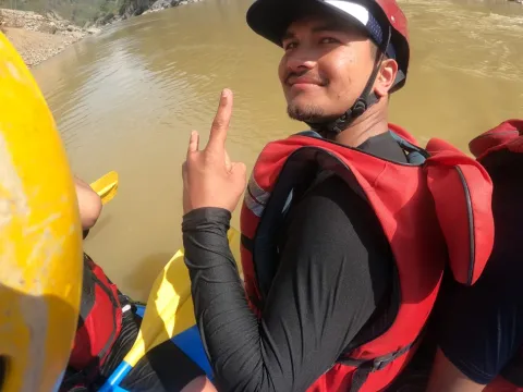 Rafters experiencing thrilling waves on the Sunkoshi River