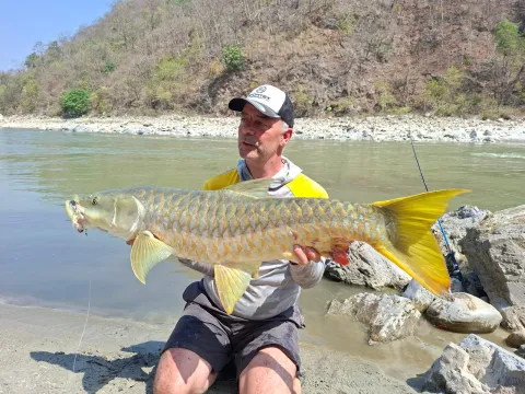 Golden Mahseer fishing in the Seti Karnali River, Nepal
