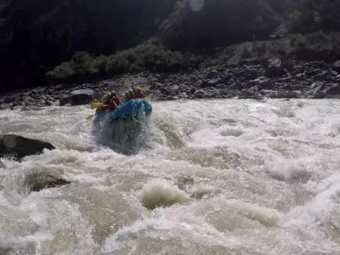 Trishuli River rafting adventure surrounded by Nepal's green hills
