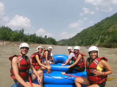 Trishuli River rafting adventure surrounded by Nepal's green hills
